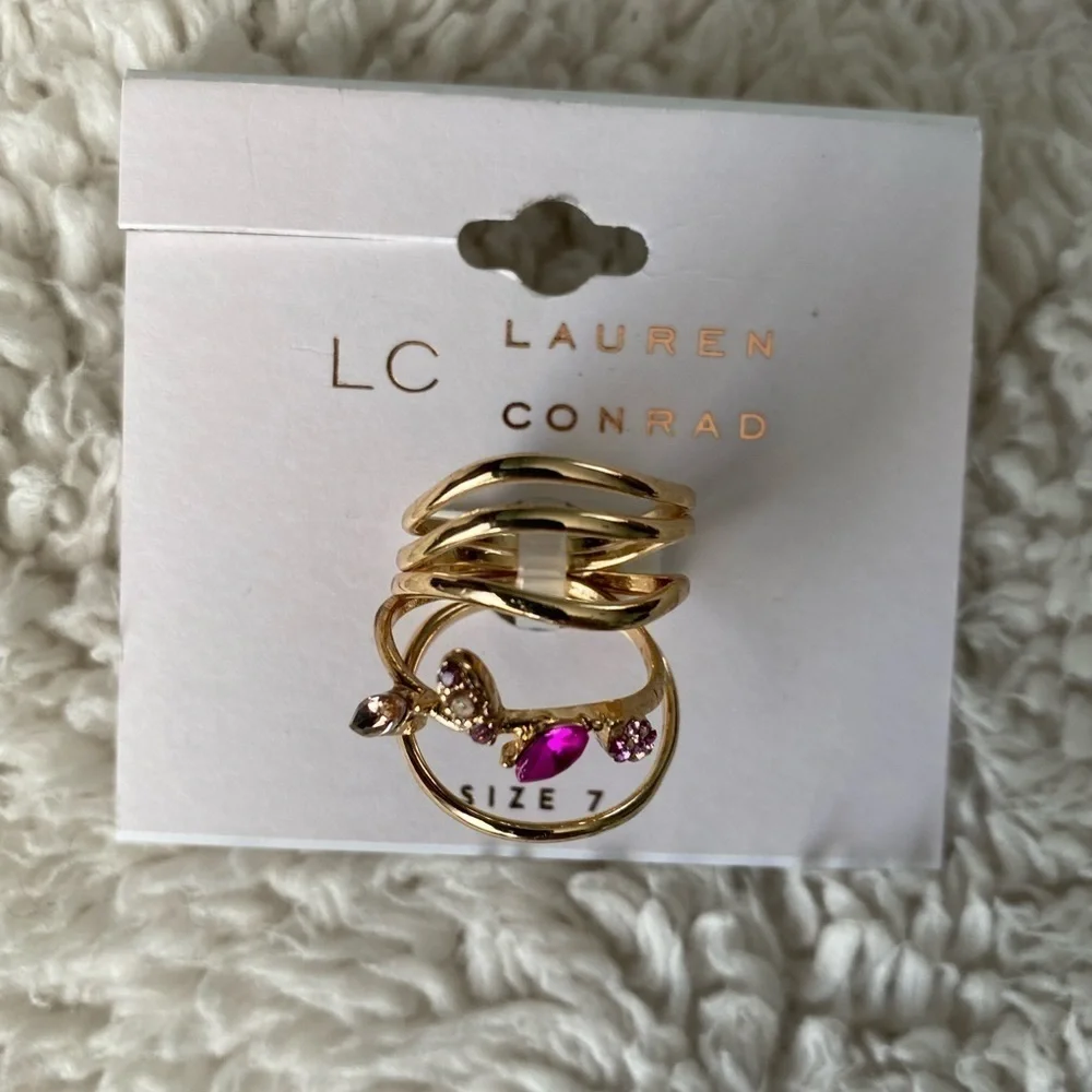 NWT LC Lauren Conrad Rose Gold Tone
Clear Simulated Stones & Wavy Bands Ring Set - Picture 3 of 4